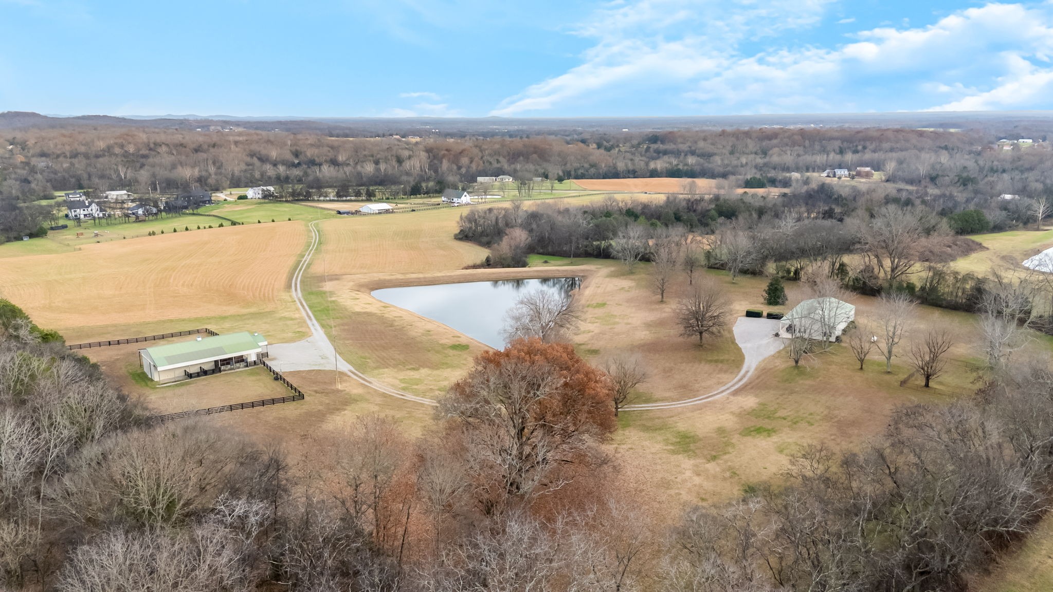 3100 Floyd Road Eagleville, TN 37060 - Photo 5 of 63 a view of a lake with a mountain in the background
