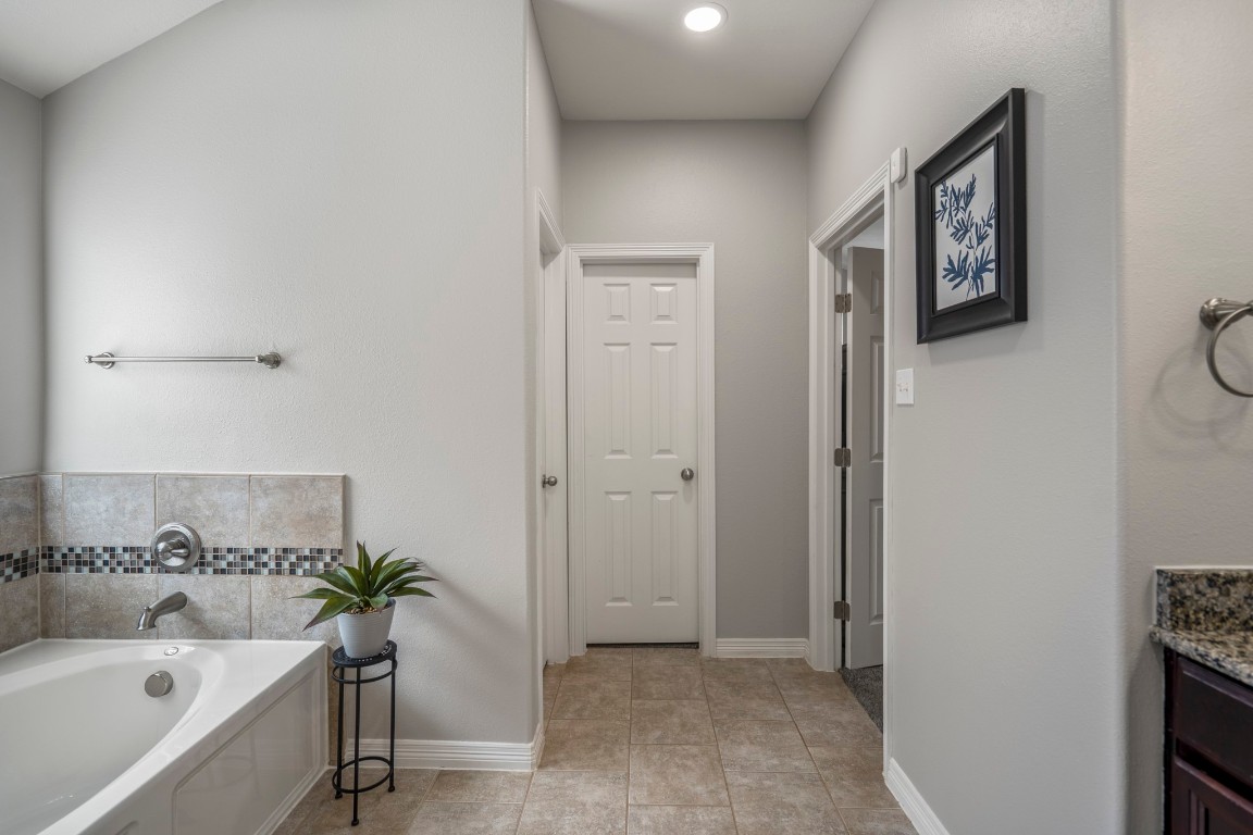 27135 Cottage Stream Lane Fulshear, TX 77441 - Photo 24 of 42 Thoughtfully designed primary bath with a spacious layout and seamless flow for everyday comfort.