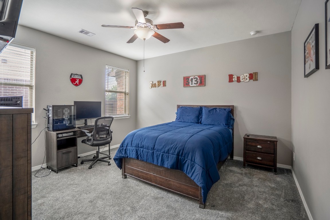 27135 Cottage Stream Lane Fulshear, TX 77441 - Photo 27 of 42 Spacious secondary bedroom offering plenty of space for rest, work or play - perfect for today's lifestyle.