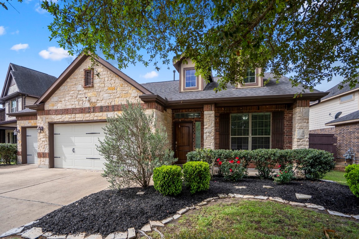 27135 Cottage Stream Lane Fulshear, TX 77441 - Photo 34 of 42 Charming one story home with a brick and stone elevation, manicured landscaping and great front yard.