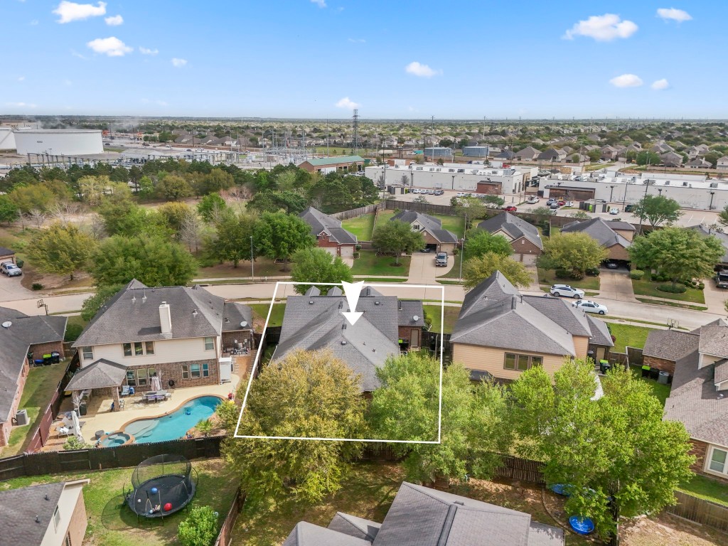 27135 Cottage Stream Lane Fulshear, TX 77441 - Photo 41 of 42 Aerial view highlighting the home's location and surrounding neighborhood from the rear perspective.
