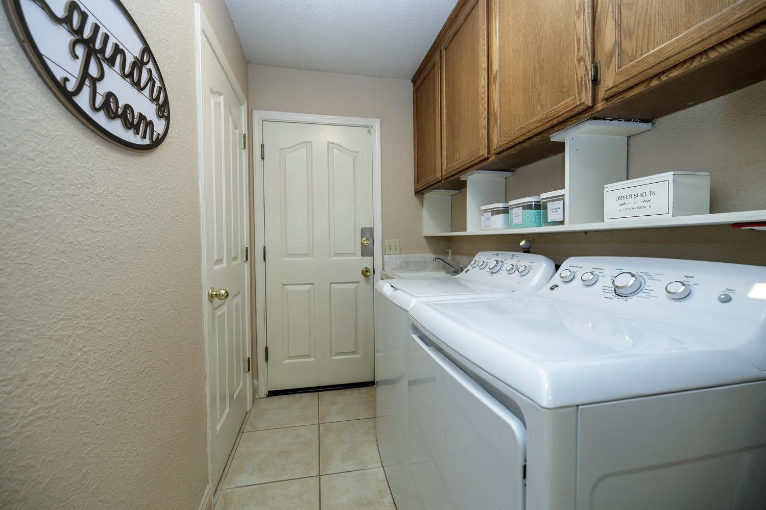 230 Meyenberg Avenue Ripon, CA 95366 - Photo 42 of 52 a utility room with a sink