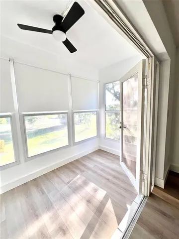a view of an empty room and window