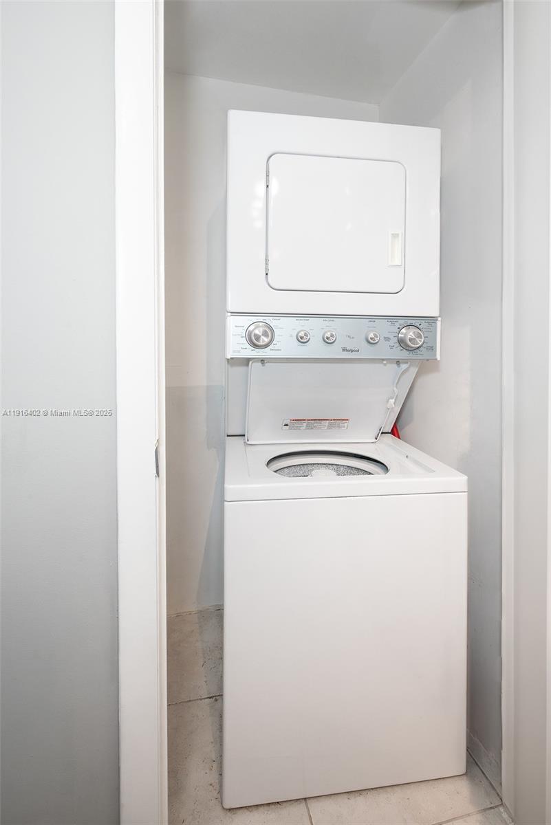 1900 North Bayshore Drive, Unit 4019 Miami, FL 33132 - Photo 15 of 31 a utility room with dryer and washer