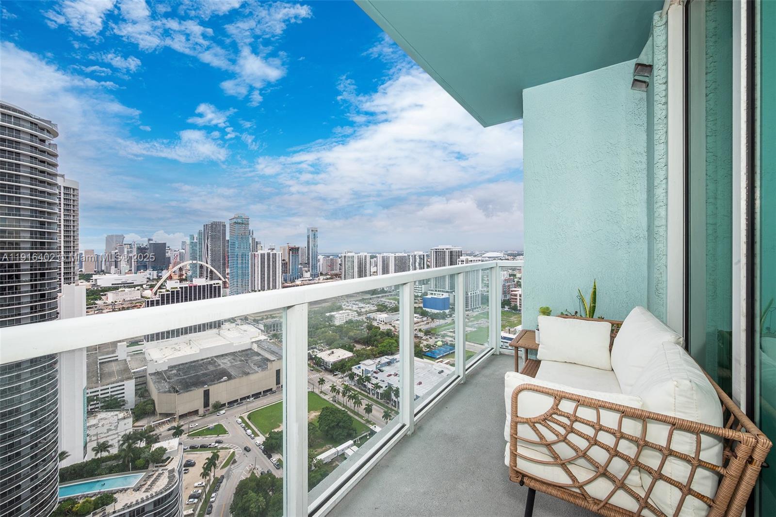 1900 North Bayshore Drive, Unit 4019 Miami, FL 33132 - Photo 20 of 31 a view of balcony with furniture