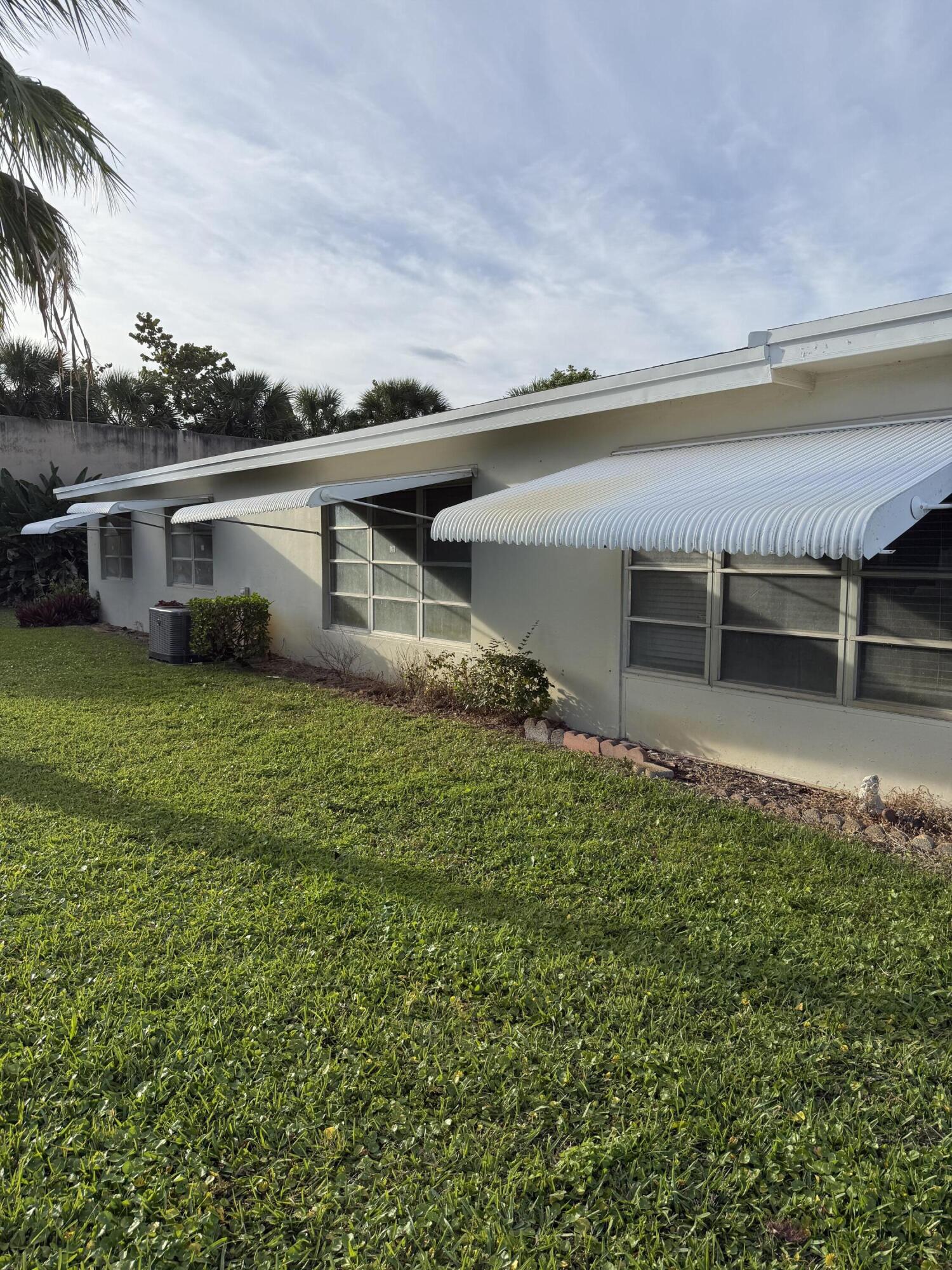 3311 Valley Road, Unit D Boynton Beach, FL 33435 - Photo 3 of 32 SIDE