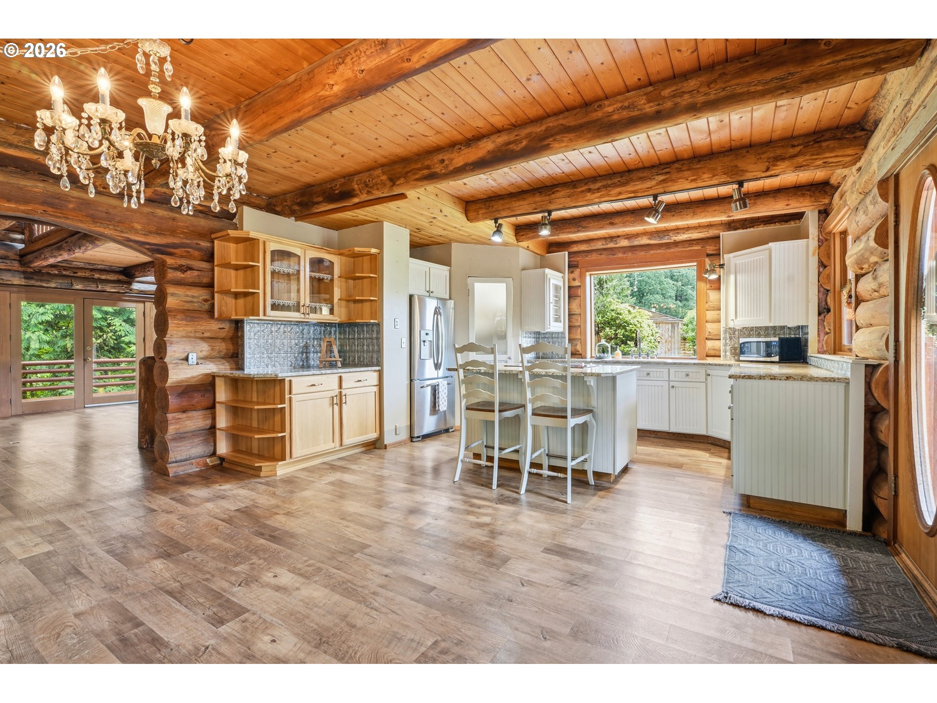 29870 South Dhooghe Road Colton, OR 97017 - Photo 5 of 48 a kitchen with stainless steel appliances wooden floor and a refrigerator