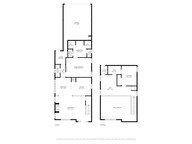 an empty room with wooden floor fireplace and windows