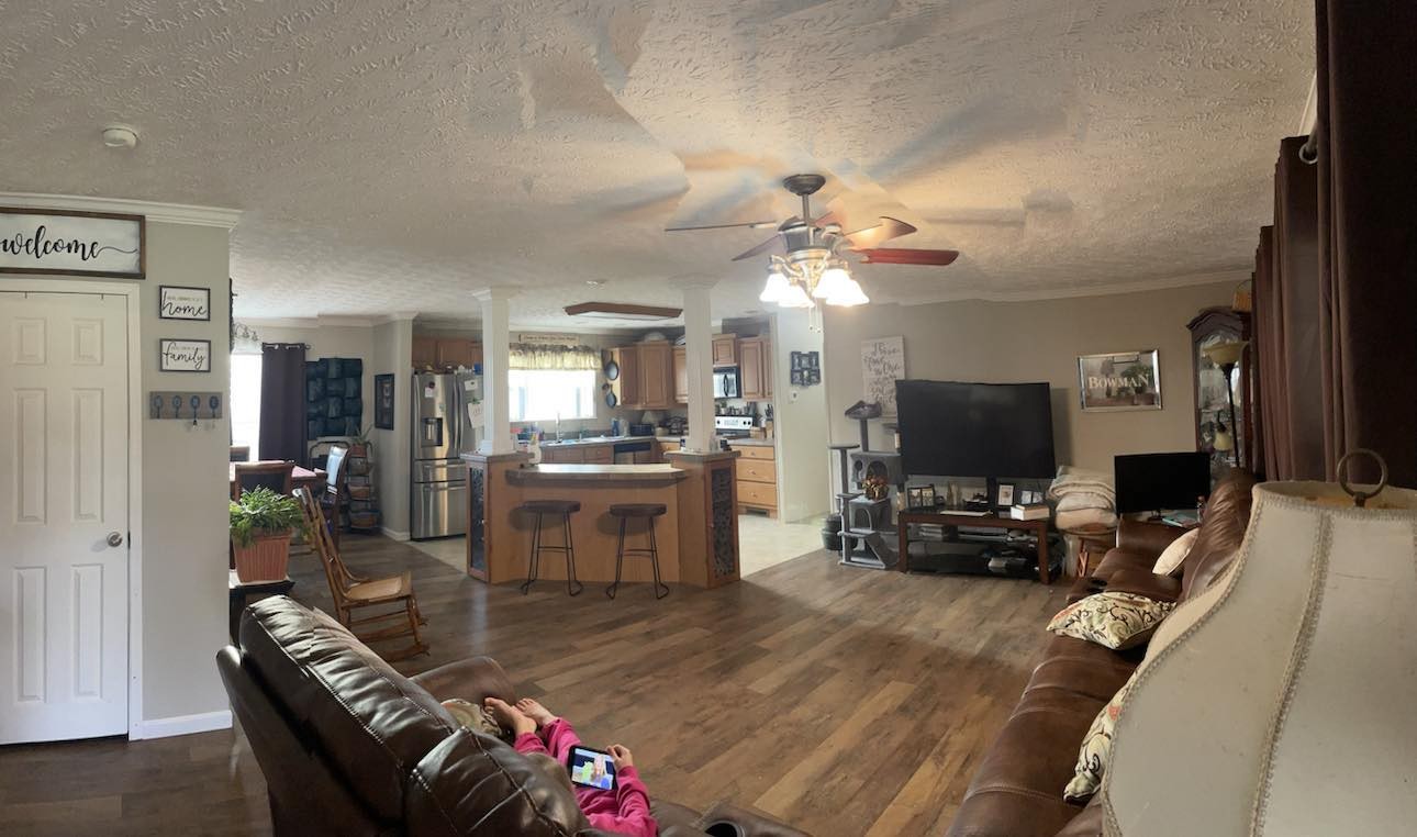 239 Calvert Ridge Road Westmoreland, TN 37186 - Photo 15 of 27 a living room with furniture and a flat screen tv
