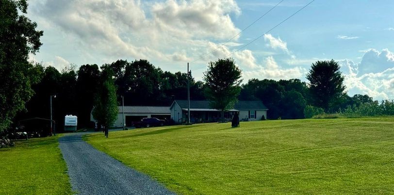 239 Calvert Ridge Road Westmoreland, TN 37186 - Photo 2 of 27 a view of a house with a big yard