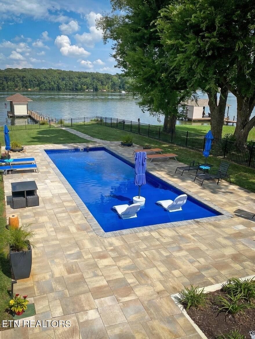 3702 Promontory Point Louisville, TN 37777 - Photo 51 of 60 a view of a swimming pool with a yard and a fountain
