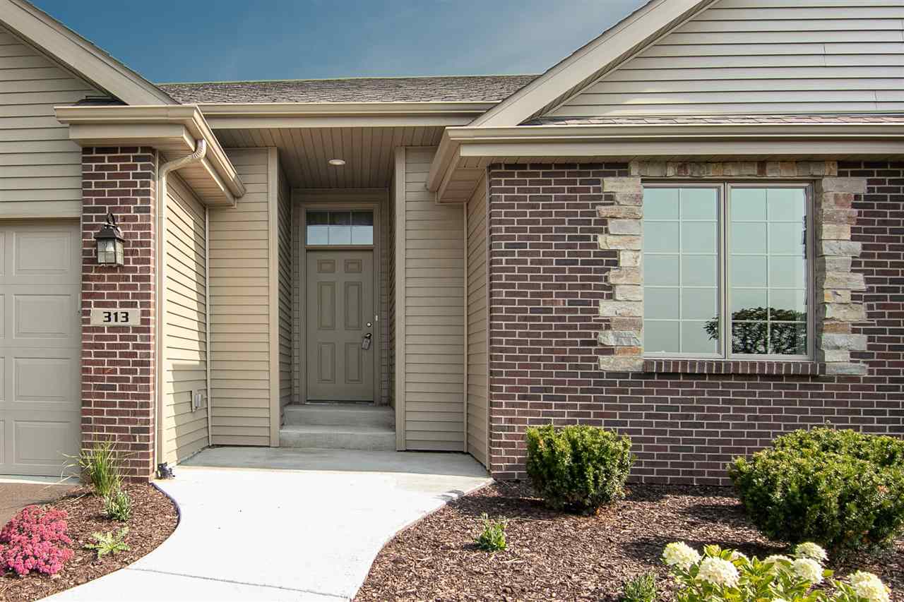 313 East Pershing Road Stillman Valley, IL 61084 - Photo 2 of 21 a front view of a house