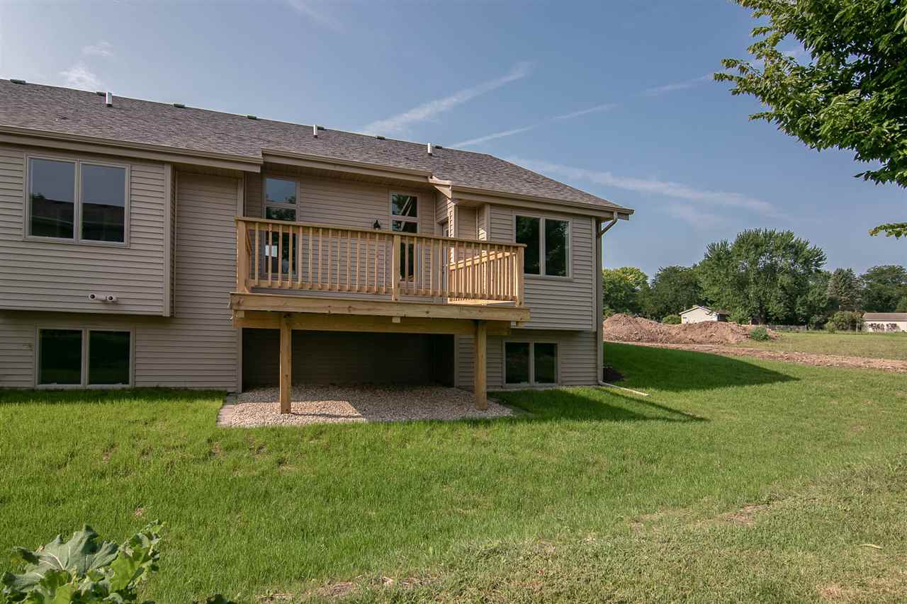 313 East Pershing Road Stillman Valley, IL 61084 - Photo 21 of 21 a house that is sitting in the grass