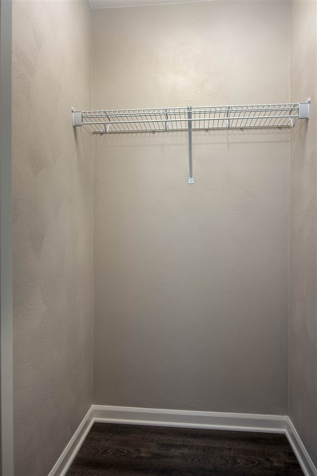313 East Pershing Road Stillman Valley, IL 61084 - Photo 8 of 21 a view of a room with racks on the wall
