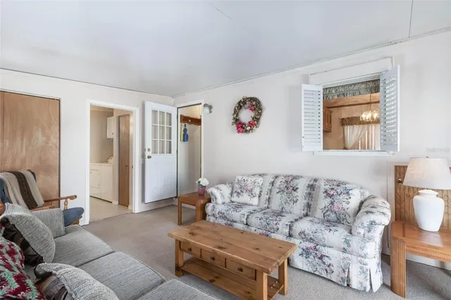 a living room with furniture and a couch