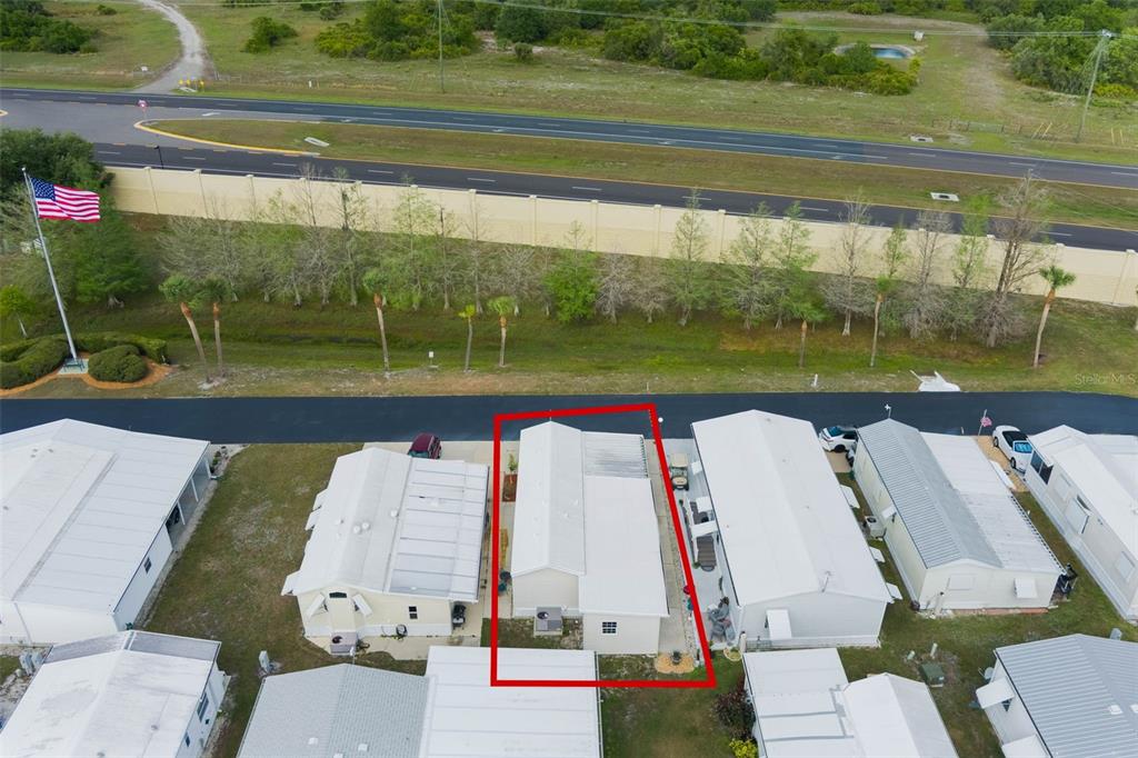 7723 Golf Boulevard Zolfo Springs, FL 33890 - Photo 21 of 24 a view of swimming pool with a patio and a yard