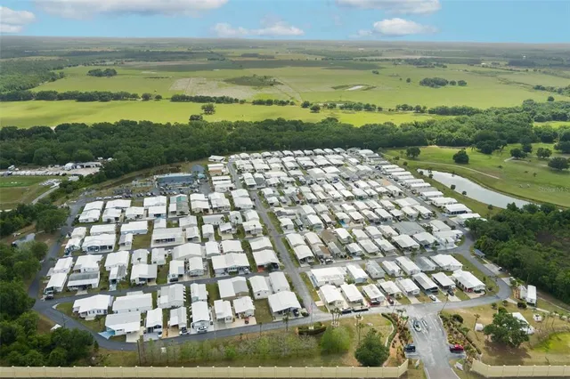 a view of an ocean with a building in the background
