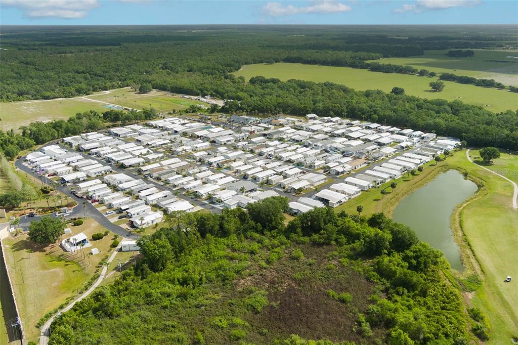 7723 Golf Boulevard Zolfo Springs, FL 33890 - Photo 23 of 24 a view of a lake with a yard