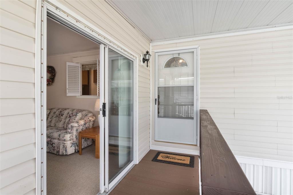 7723 Golf Boulevard Zolfo Springs, FL 33890 - Photo 3 of 24 a bathroom with a tub shower and bedroom