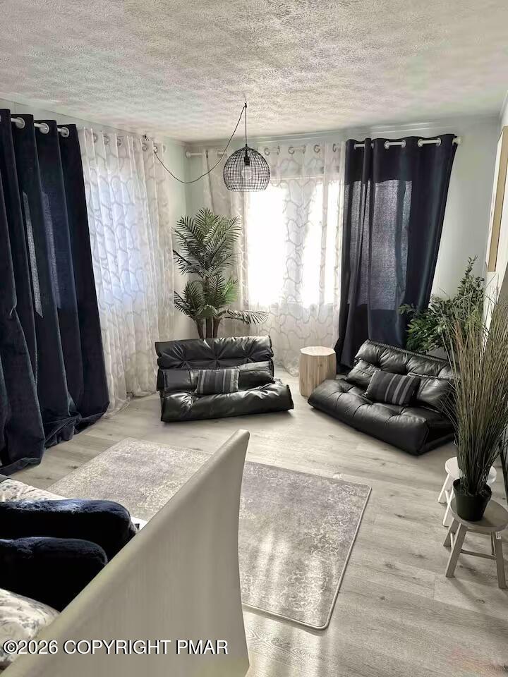 275 Canterbury Road Bushkill, PA 18324 - Photo 16 of 28 a living room with furniture and a window