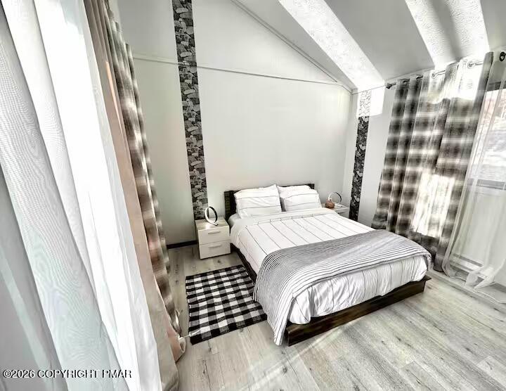 275 Canterbury Road Bushkill, PA 18324 - Photo 9 of 28 a bedroom with a bed and a mirror