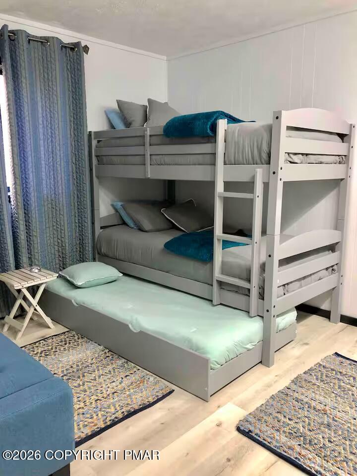 275 Canterbury Road Bushkill, PA 18324 - Photo 10 of 28 a bedroom with a bed and cabinets