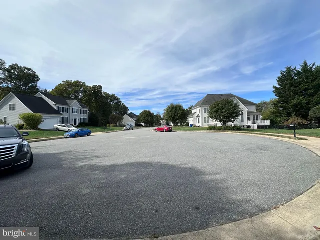 a view of street with houses