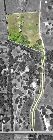 a view of a street with a building in the background