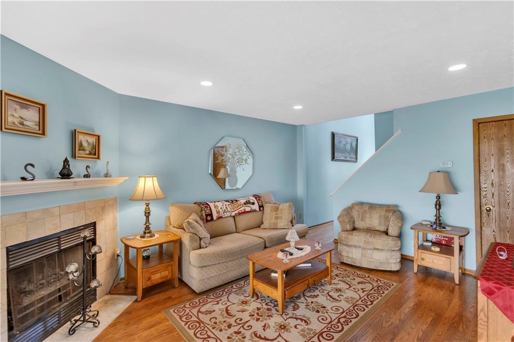 68 New London Lane Oakmont, PA 15139 - Photo 11 of 25 a living room with furniture and a fireplace