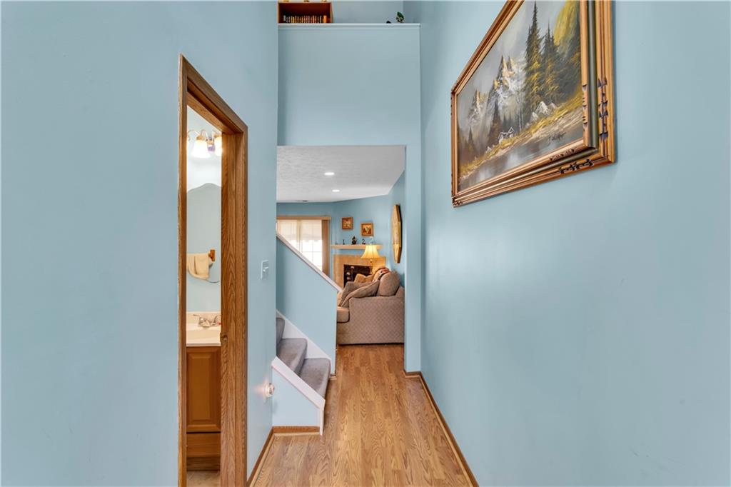 68 New London Lane Oakmont, PA 15139 - Photo 6 of 25 a view of a hallway with wooden floor and staircase