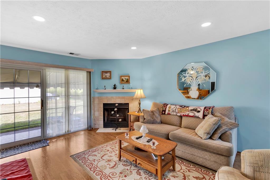 68 New London Lane Oakmont, PA 15139 - Photo 10 of 25 a living room with furniture and a fireplace