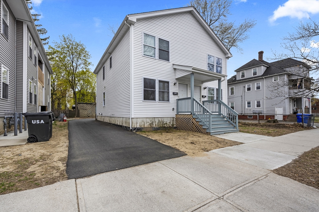 91-93 Alderman Street Springfield, MA 01108 - Photo 2 of 30 a view of a house with a yard