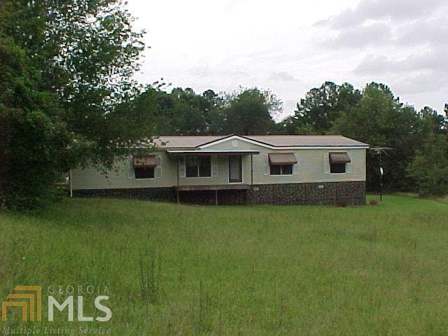 338 Miller Agan Road Temple, GA 30179 - Photo 1 of 1 a front view of a house with a garden