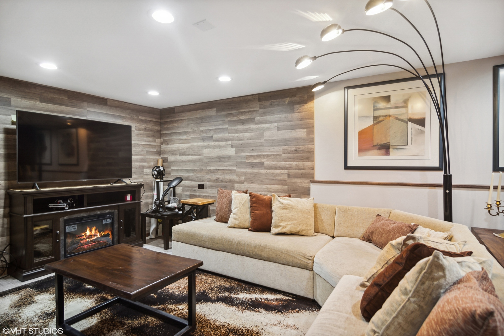 300 Raupp Boulevard Buffalo Grove, IL 60089 - Photo 6 of 13 a living room with furniture and a flat screen tv