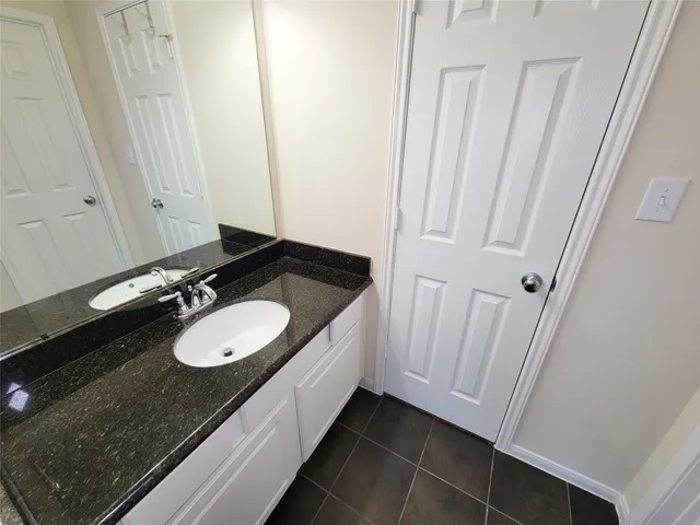 a view of a building with a yard