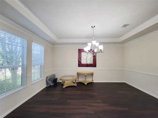 a view of kitchen and kitchen with furniture wooden floor and window