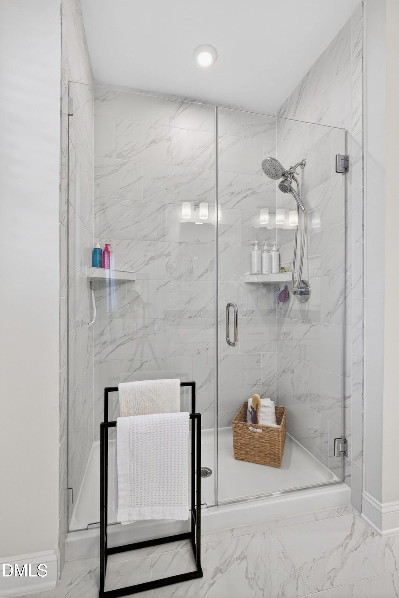 1063 Danvers Loop Apex, NC 27523 - Photo 45 of 67 a bathroom with a shower