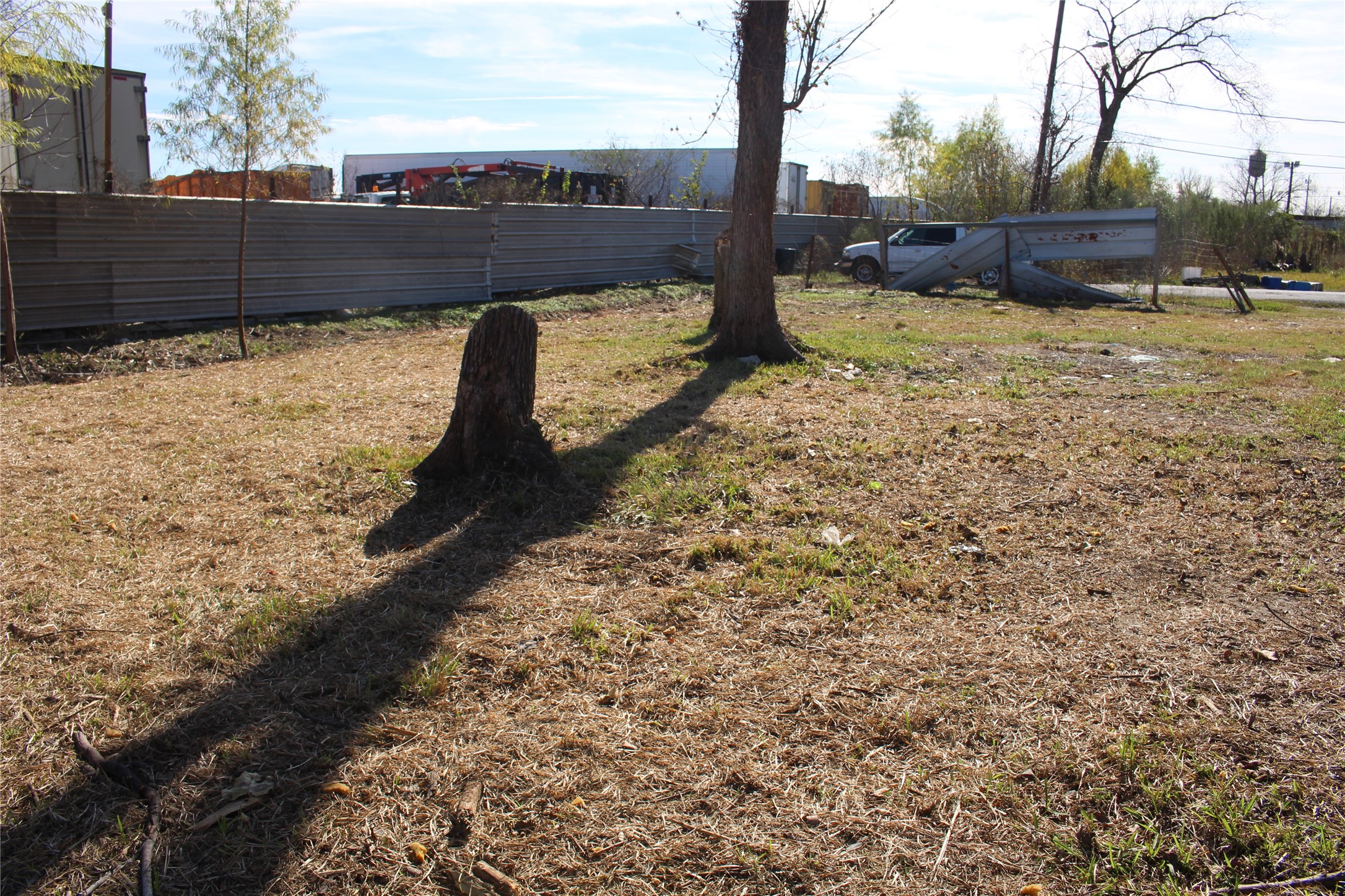 8231 Mendez Street Houston, TX 77029 - Photo 4 of 6 a view of a yard with wooden fence
