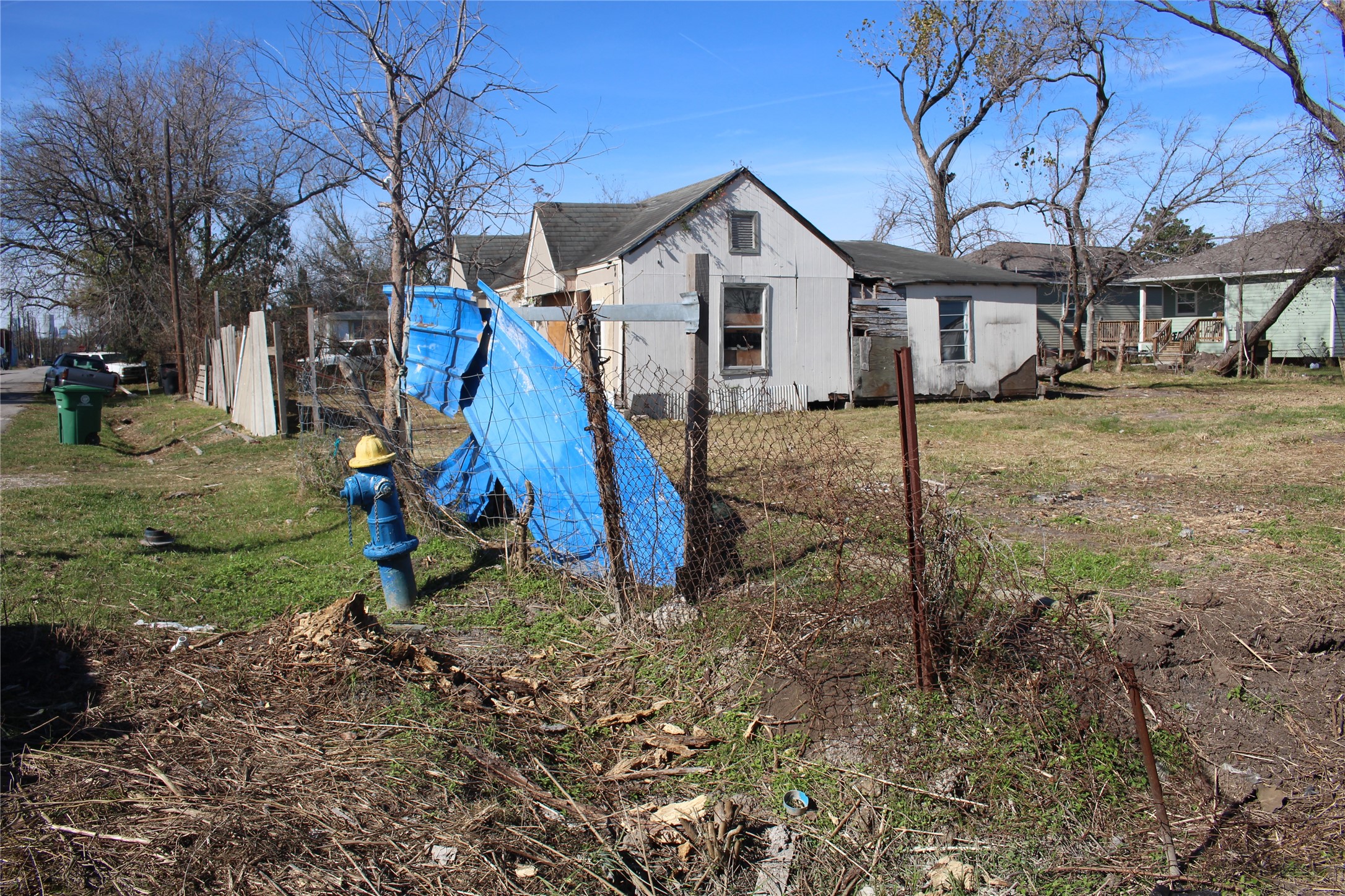 8231 Mendez Street Houston, TX 77029 - Photo 5 of 6 a view of a house with a yard