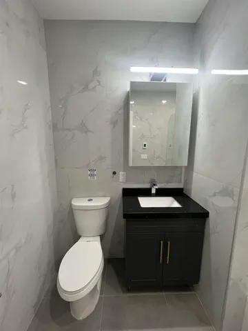 a bathroom with a sink and a toilet