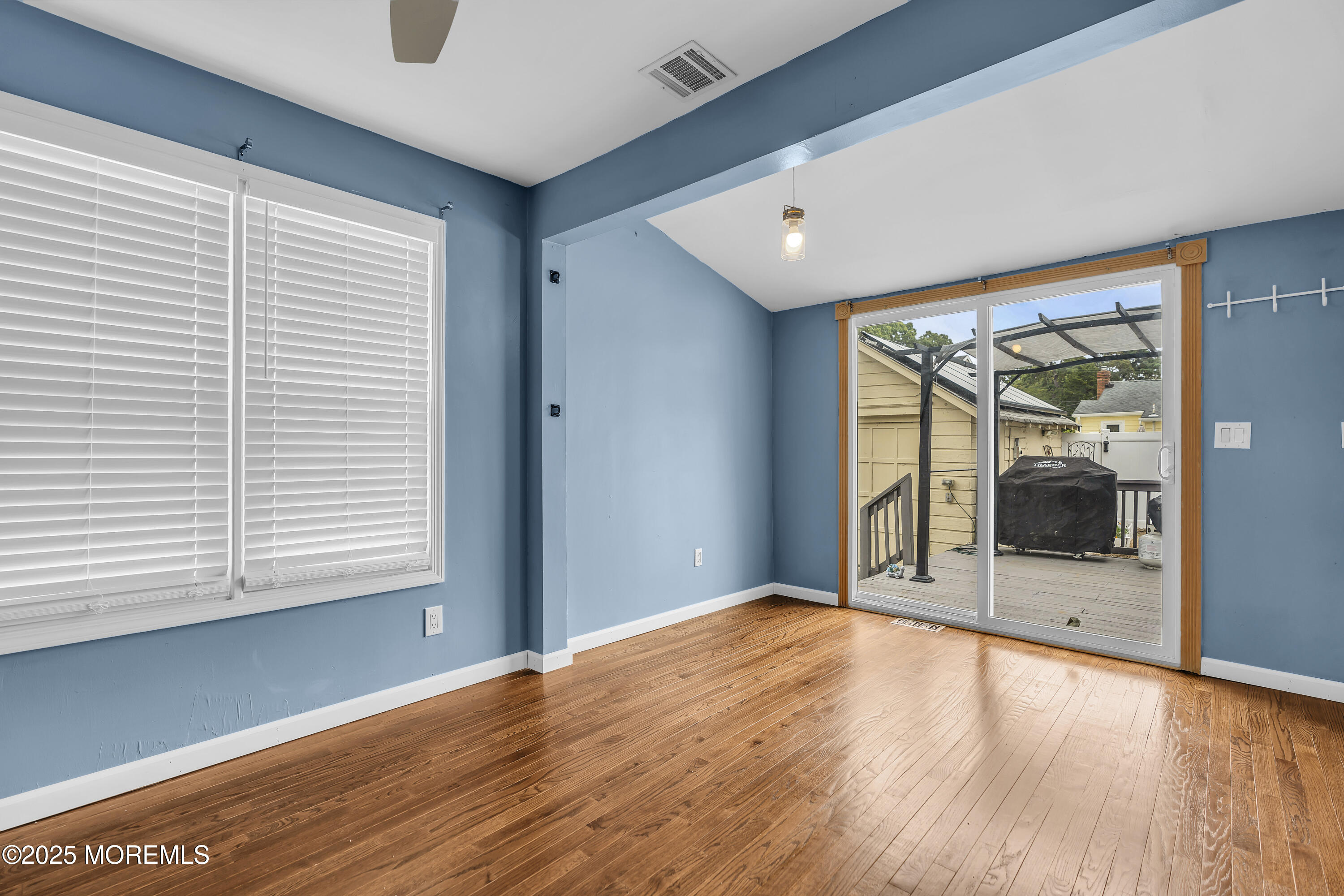 111 Breton Road Brick, NJ 08723 - Photo 19 of 59 a view of empty room with wooden floor and fan