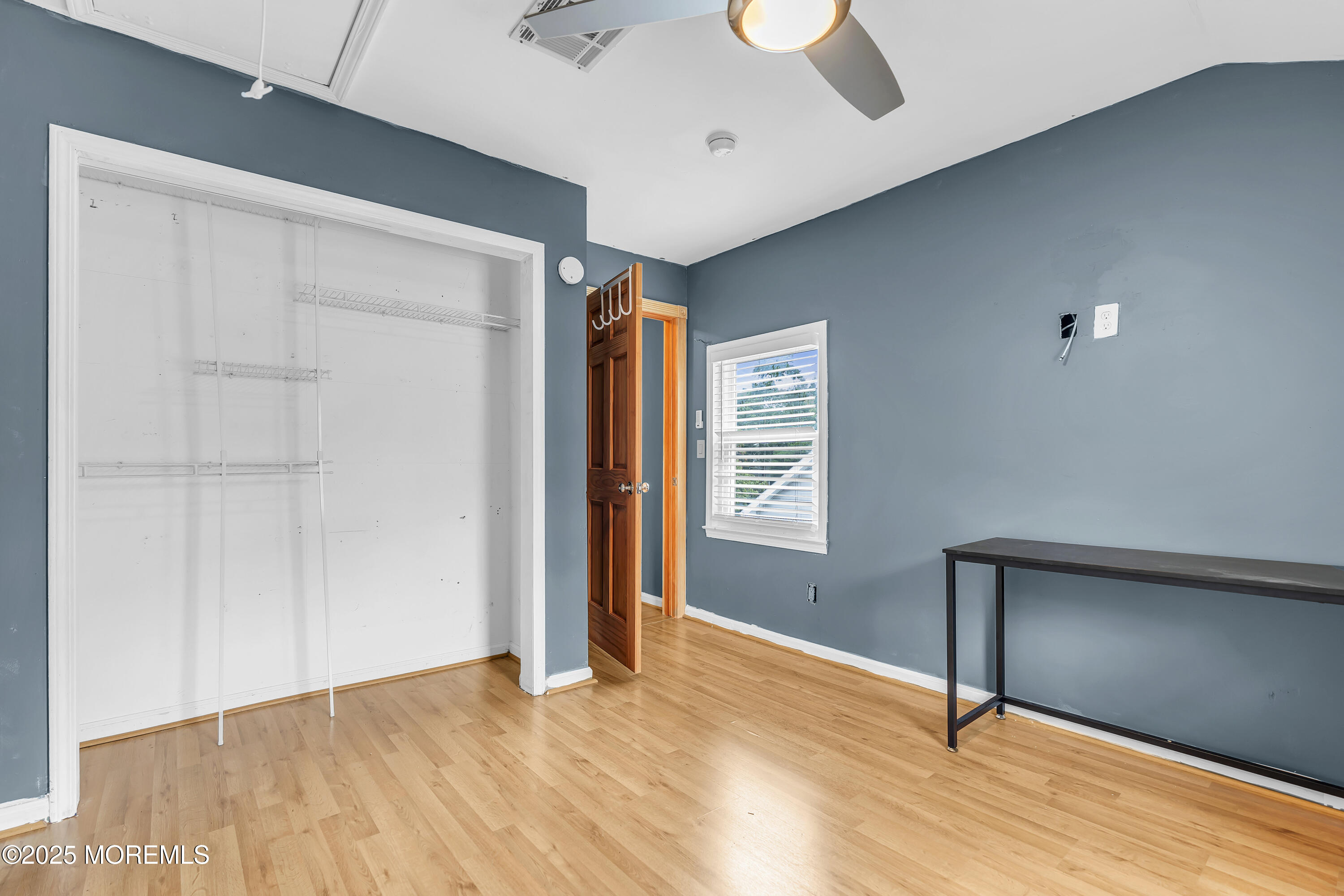 111 Breton Road Brick, NJ 08723 - Photo 27 of 59 a view of empty room with wooden floor and fan