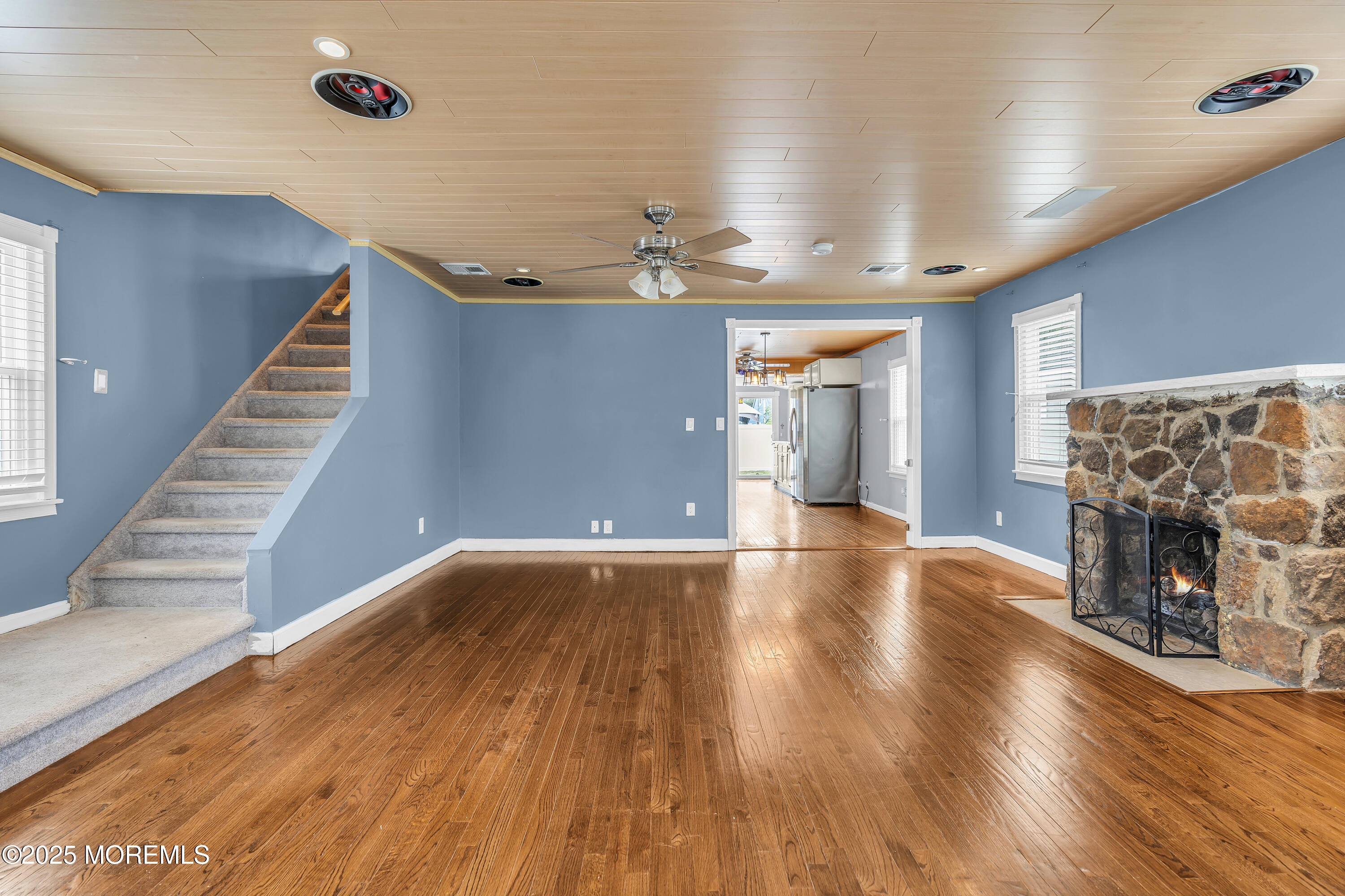 111 Breton Road Brick, NJ 08723 - Photo 3 of 59 a view of a livingroom with wooden floor and a fireplace