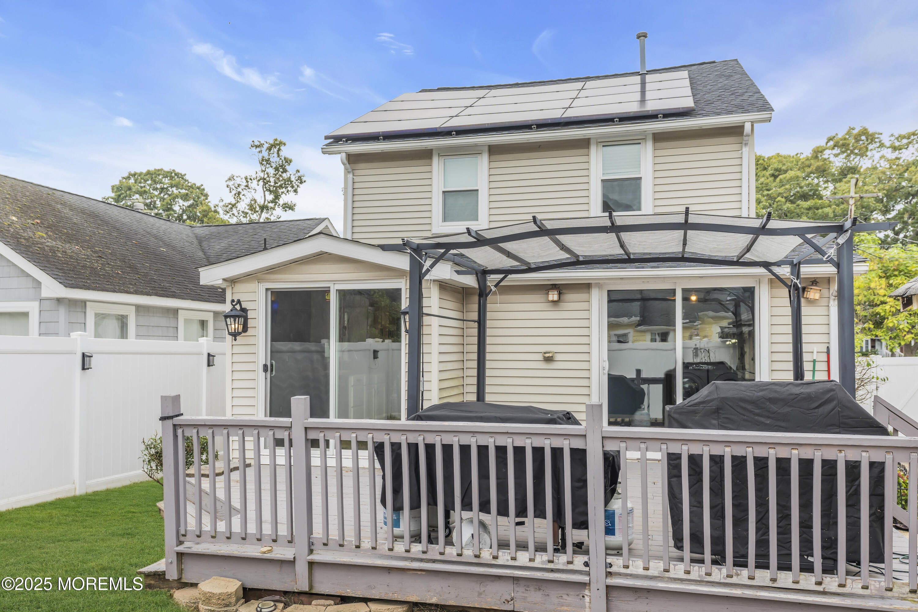 111 Breton Road Brick, NJ 08723 - Photo 32 of 59 a view of a house with a deck