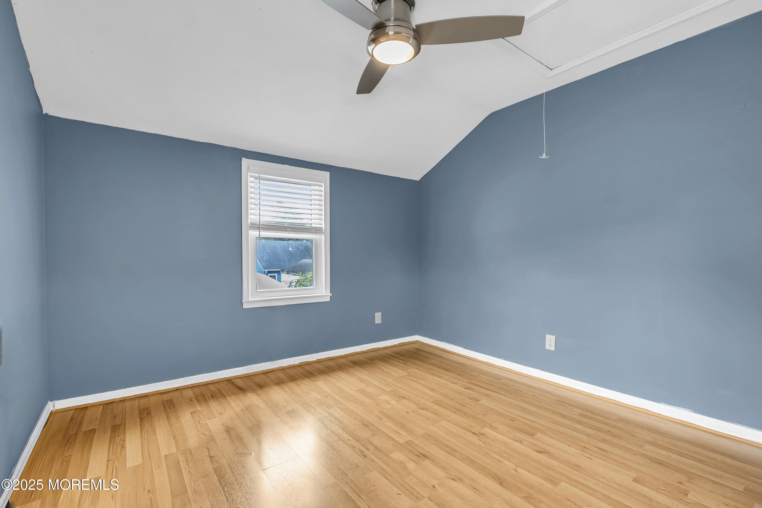 111 Breton Road Brick, NJ 08723 - Photo 42 of 59 an empty room with a window and ceiling fan