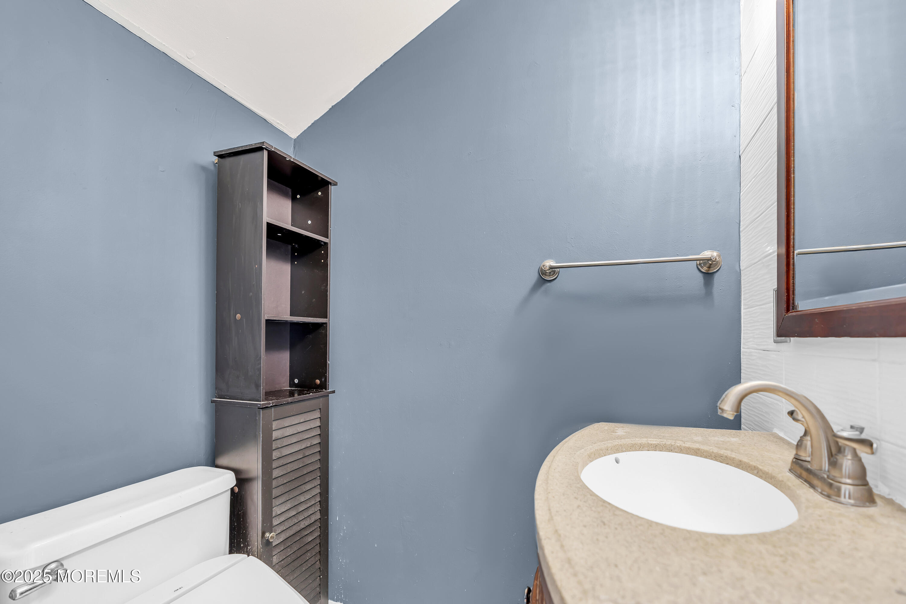 111 Breton Road Brick, NJ 08723 - Photo 44 of 59 a bathroom with a toilet sink vanity tub and mirror