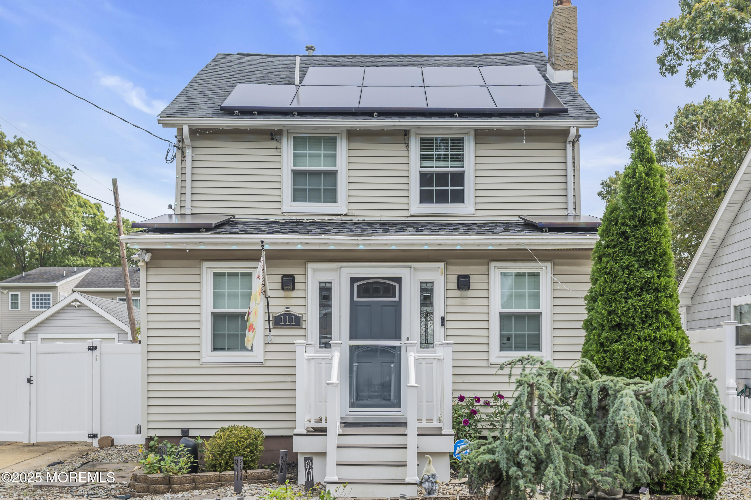 111 Breton Road Brick, NJ 08723 - Photo 46 of 59 a front view of a house with a yard