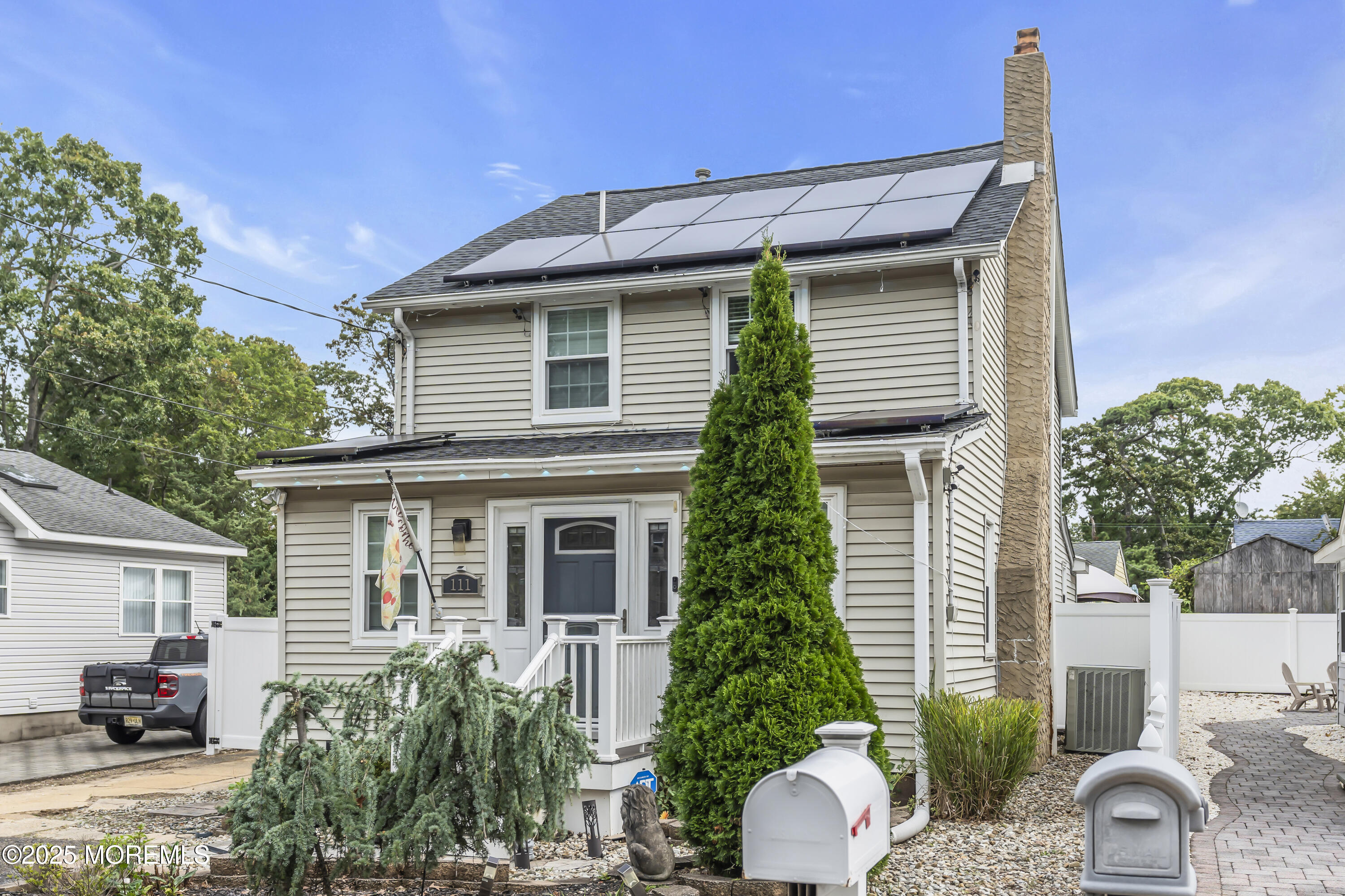 111 Breton Road Brick, NJ 08723 - Photo 48 of 59 a front view of a house with garden