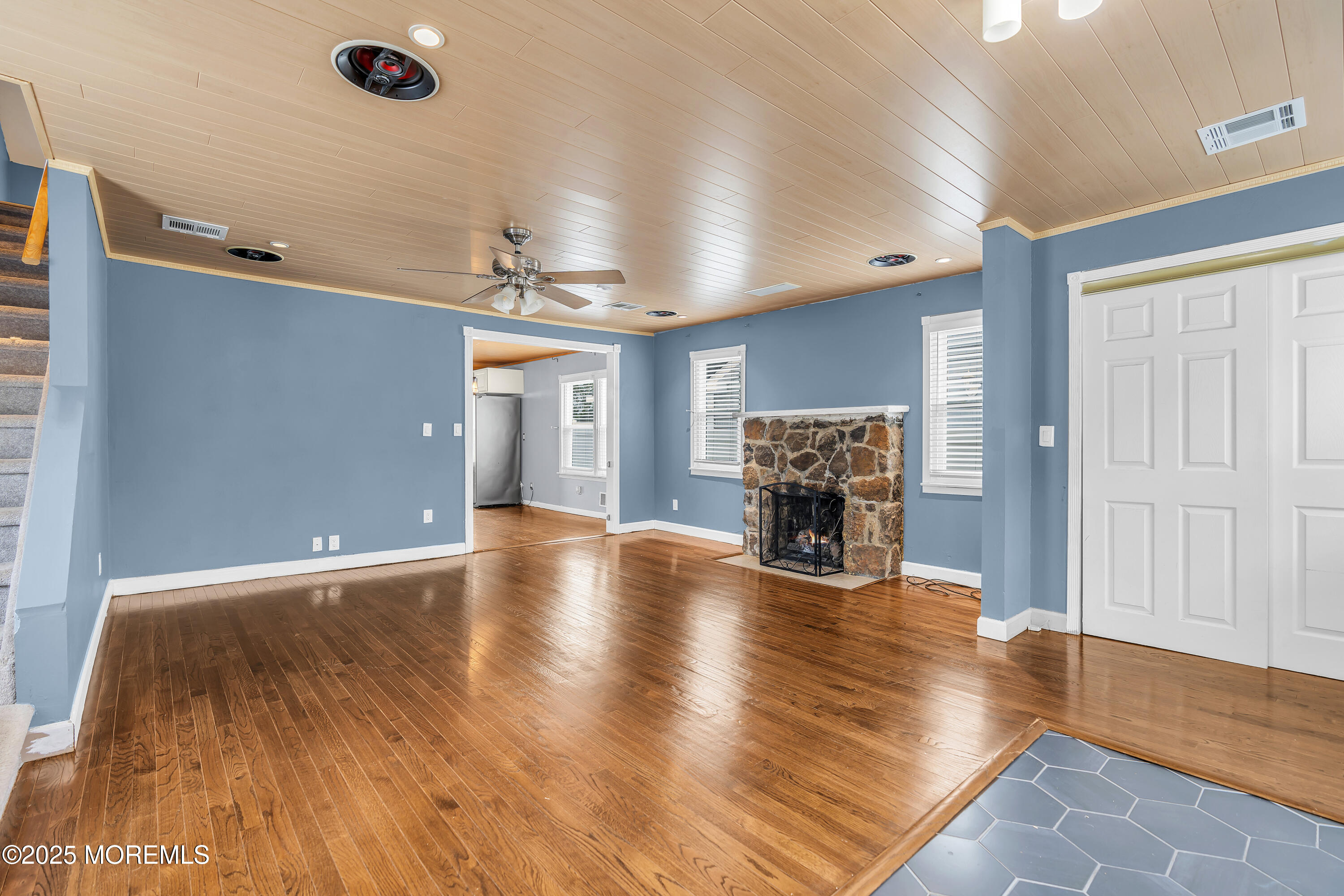 111 Breton Road Brick, NJ 08723 - Photo 54 of 59 a view of a livingroom with fireplace and wooden floor