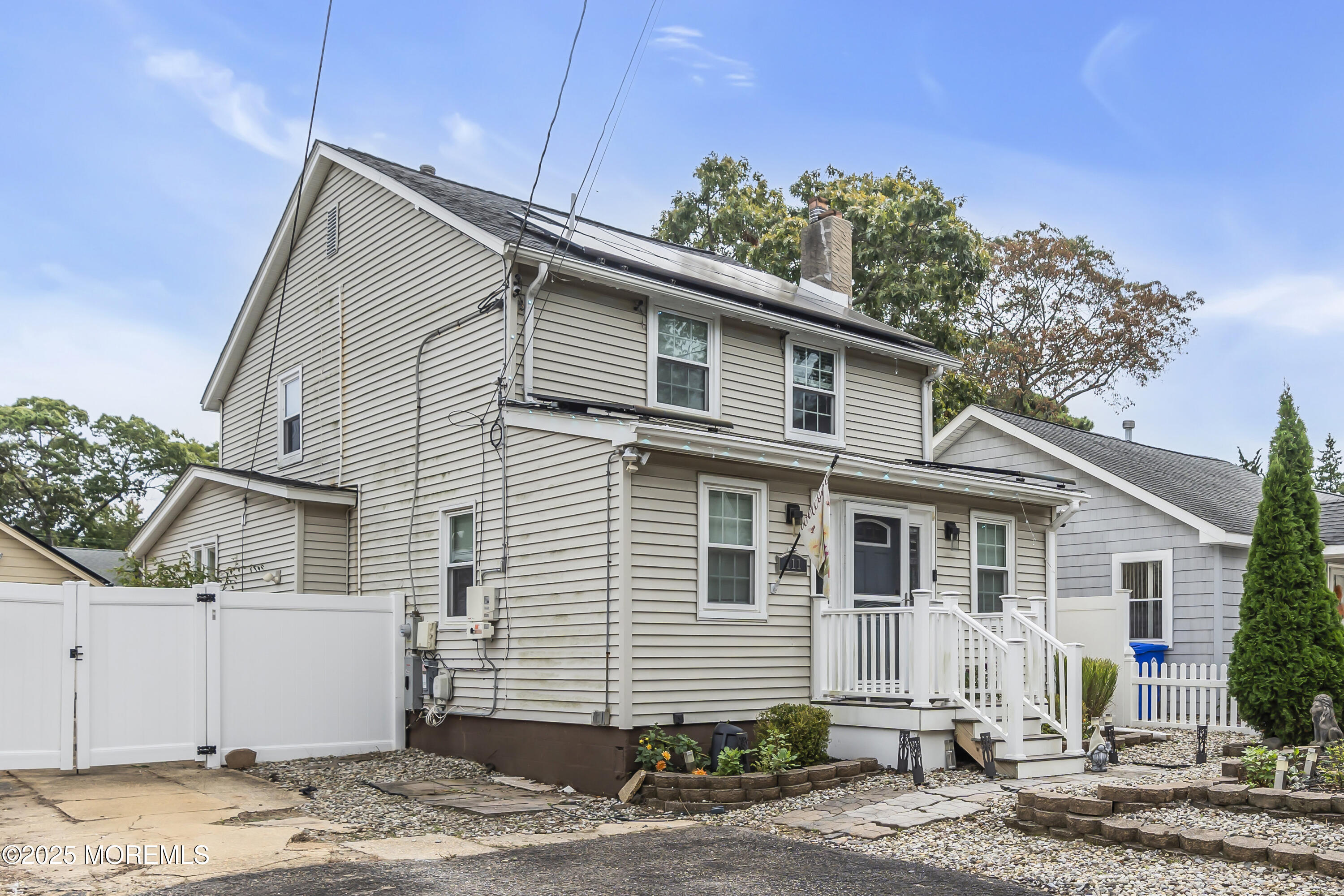 111 Breton Road Brick, NJ 08723 - Photo 56 of 59 a front view of a house with a patio